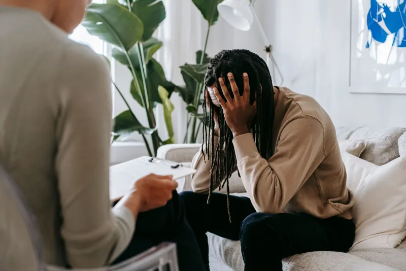 Trauma therapy session in Tampa with client receiving support in a safe space